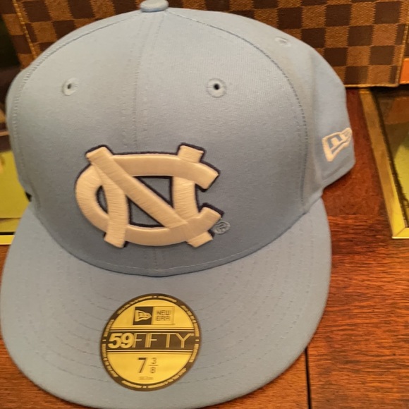 Pre-owned NC sport cap size 7 3/8. Some spots but still overall good . - Picture 6 of 7